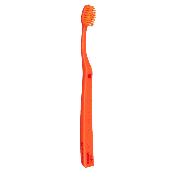 edel+white Ultrasoft Flosserbrush SWISS in PET box - Léger, flexible et avec des poils coniques ultra-doux. Illustration brosse à dents en différentes couleurs.