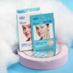 Dr. Belmeur Clarifying Cover Spot Patches – transparente Akne- und Pickelpflaster mit Teebaumöl, Salicylsäure und Fireweed-Extrakt. Abbildung Inhalt des Produkts mit Watte im Hintergrund.